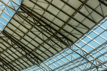 Glass roof with steel structure. Modern ceiling architecture