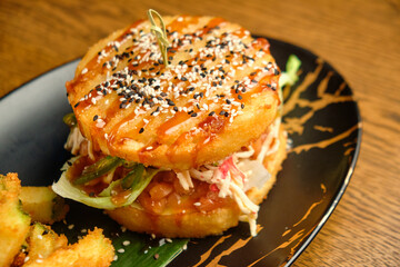 Pumpkin burger with nuts and chickpeas with tomato salsa, spinach