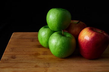 apples on a wooden background