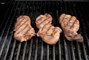 Grilling Beef Tenderloin Steaks on a Hot Summer Grill