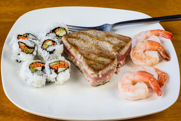 tuna steak served with california vegetable roll
