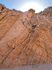 Small canyon with red sandstone rocks, Nabq protected area, Sharm El Sheikh, Sinai peninsula, Egypt, North Africa. Egyptian safari