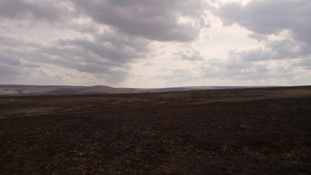 Drone flying above cloudy Yorkshire moorlands