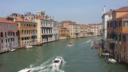 Views of the most beautiful canal of Venice - Grand Canal water streets, boats, gondolas, mansions along. Italy.