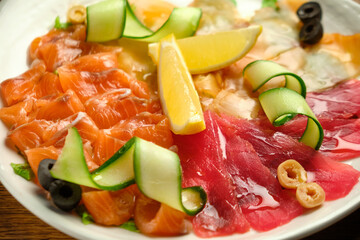 Slices of salted salmon with pepper and vegetables