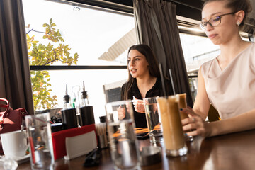 Having a meeting in the cafe about the company ideas