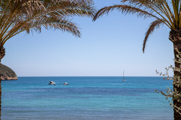 nice day at the beach on the coast of alicante to walk, sail or practice some sport.