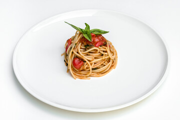 Pasta with vegetables, Asian cuisine. Photo of food on a white background