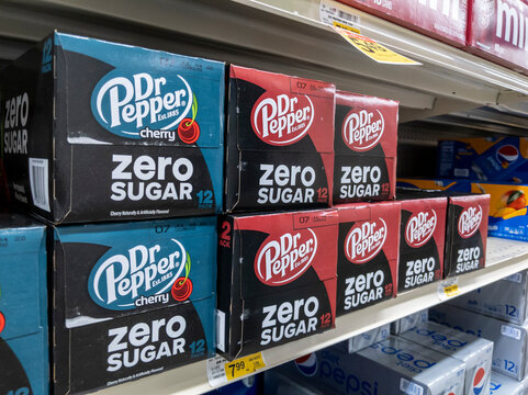 Woodinville, WA USA - Circa April 2022: Angled View Of Dr. Pepper Soda Can Cases For Sale In The Soft Drink Aisle Inside A Haggen Grocery Store.