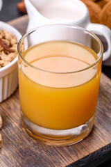 Delicious nutritious healthy breakfast with granola, eggs, oat cookies, milk and jam