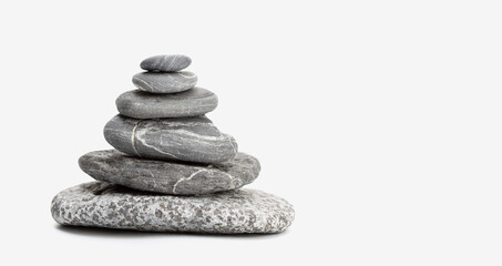Fototapeta na wymiar Balanced Stones isolated on white background with copy space. Balancing Pebbles. Life balance and harmony concept