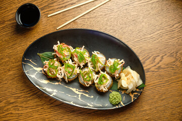 A set of hot sushi rolls with salmon