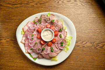 Steak tartar is served with capers