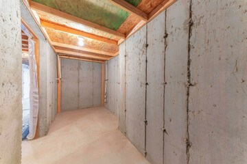 Unfinished cold storage room interior at the basement