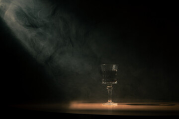 a glass of wine in a cigar club