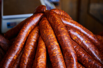 Smoked sausages on a market stall. In Hungary people like to eat very much. Kolbasz. Pork.
