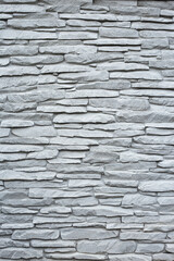 Seamless texture wall stone sandstone with shadows and deep texture. Clinker tiles or bricks on the wall in the form of wild stone