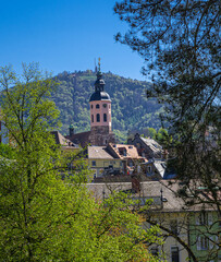 The steeple of the collegiate church in Baden Baden in the background the Merkur mountain. Baden...