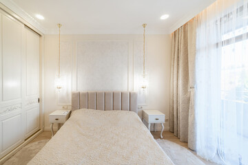 Modern interior design of the rest room. big bright bed