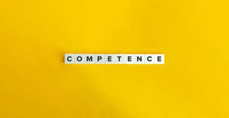 Competence Word on Letter Tiles on Yellow Background. Minimal Aesthetics.