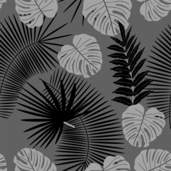 Fototapeta na wymiar Abstract monochrome background from leaves. Beautiful seamless paper art illustration with tropical palm leaves background. Leaf pattern. Natural flower pattern.