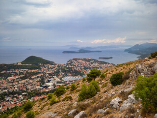 Fototapeta na wymiar Dubrovnik, Croatia - August 29, 2021: Panoramic view of Dubrovnik shot from the cable car station in the north of the city.