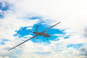 Fototapeta na wymiar Unmanned military drone on patrol air territory at high altitude.