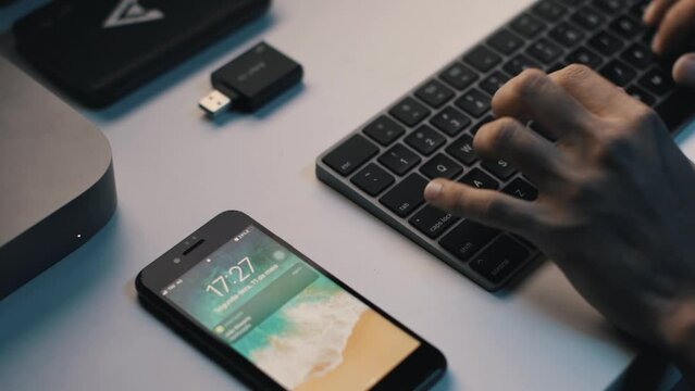 Streamline Your Workflow: The Ultimate Businessman's Workstation with a Cell Phone Keyboard and Widgets