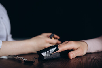 Pulse measurement on the finger lifestyle. An article about medical devices. Pulse measurement at home. Measurement of air saturation in the blood. Saturation check. Medicine and health