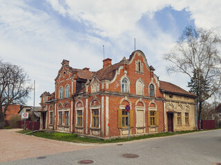 Old, historic red brick house on a spring day. Kuldiga, Latvia.