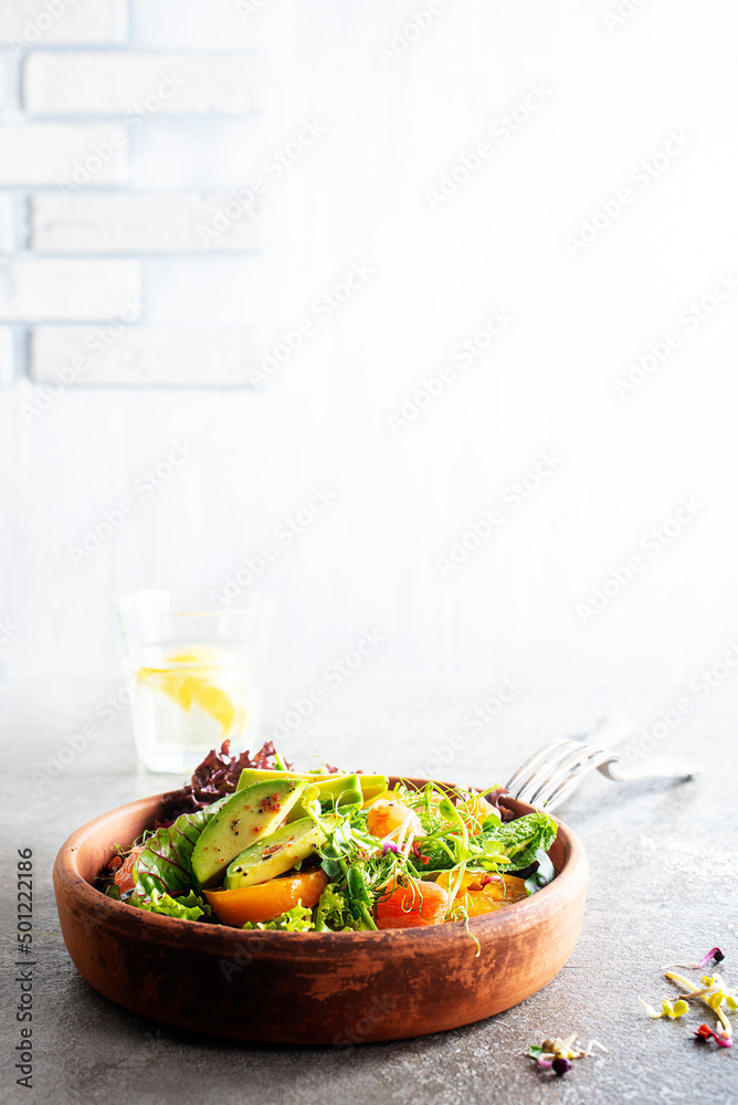 Poster Salad with avocado, tomatoes and fresh greens