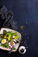 Obraz na płótnie Canvas fresh salad, salad with avocado and boiled eggs