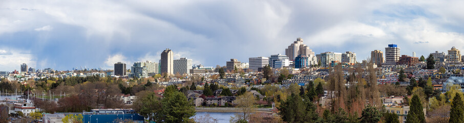Panoramic View of Vancouver City in False Creek, BC, Canada. Sunny Cloudy Day. Modern Cityscape, residential homes and buildings, Panorama.