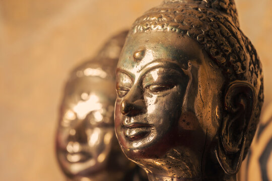 Brass statue heads of Lord Buddha