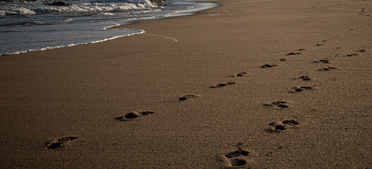footprints on the beach