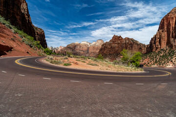 Hairpin Turn at Zion National Park in the Middle of a sunny Spring Day (Zion Park Road/Zion Mount Carmel Highway) - obrazy, fototapety, plakaty