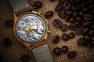 Vintage watch movement and coffee