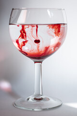 Red Shapes In The Glass