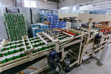 Toilet paper production line. Rolls of toilet paper on conveyor