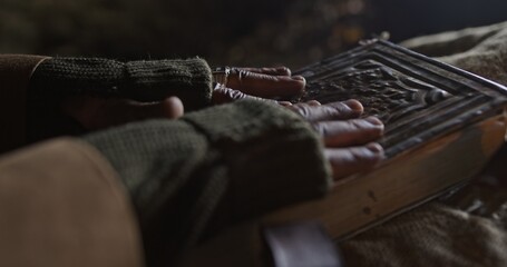 Crop magician with aged magic book
