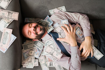 Top view of a man enjoying his money