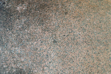 Tile texture with yellowish and black coloring. Top view