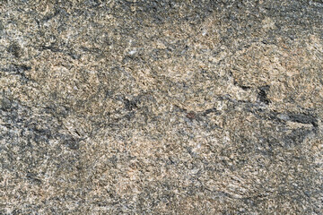 Tile texture with yellowish and black coloring. Top view