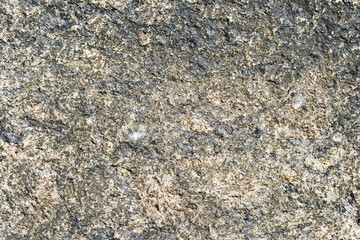 Tile texture with yellowish and black coloring. Top view