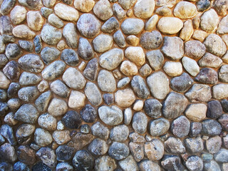 stone garden fence natural rock building wall mortar stones shadows cut stones sunlight backyard
