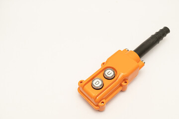 Hoist push button switch in isolated. cranes remote. Up Down hydraulic controller switch. electric remote push button switch of hoist lift or crane for control direction. choose between up or down.