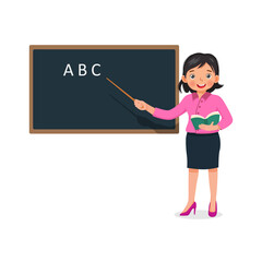 Young female teacher holding a stick pointer standing in front of class teaching on lesson at blackboard 