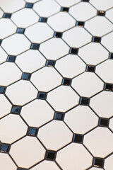 Classic red bricks wall and modern kitchen golden water tap. Interior home styling. Soft focus image.