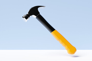 3D illustration of a metal hammer with a yellow handle hand tool isolated on a white background. 3D render and illustration of repair and installation tool