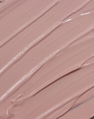 cosmetics skincare texture close up. pink cream lotion